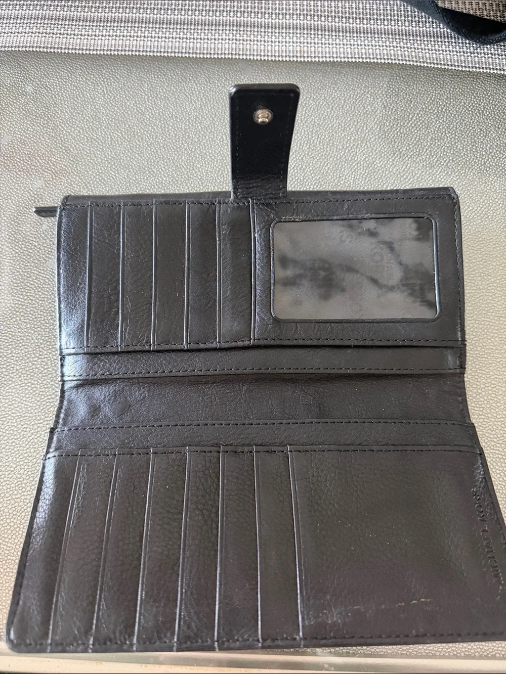 Michael Kors Black Leather Zip Continental Wallet with Silver Plaque